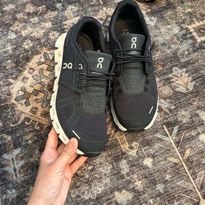 On Running Black and White Athletic Shoes with Cushioned Midsole